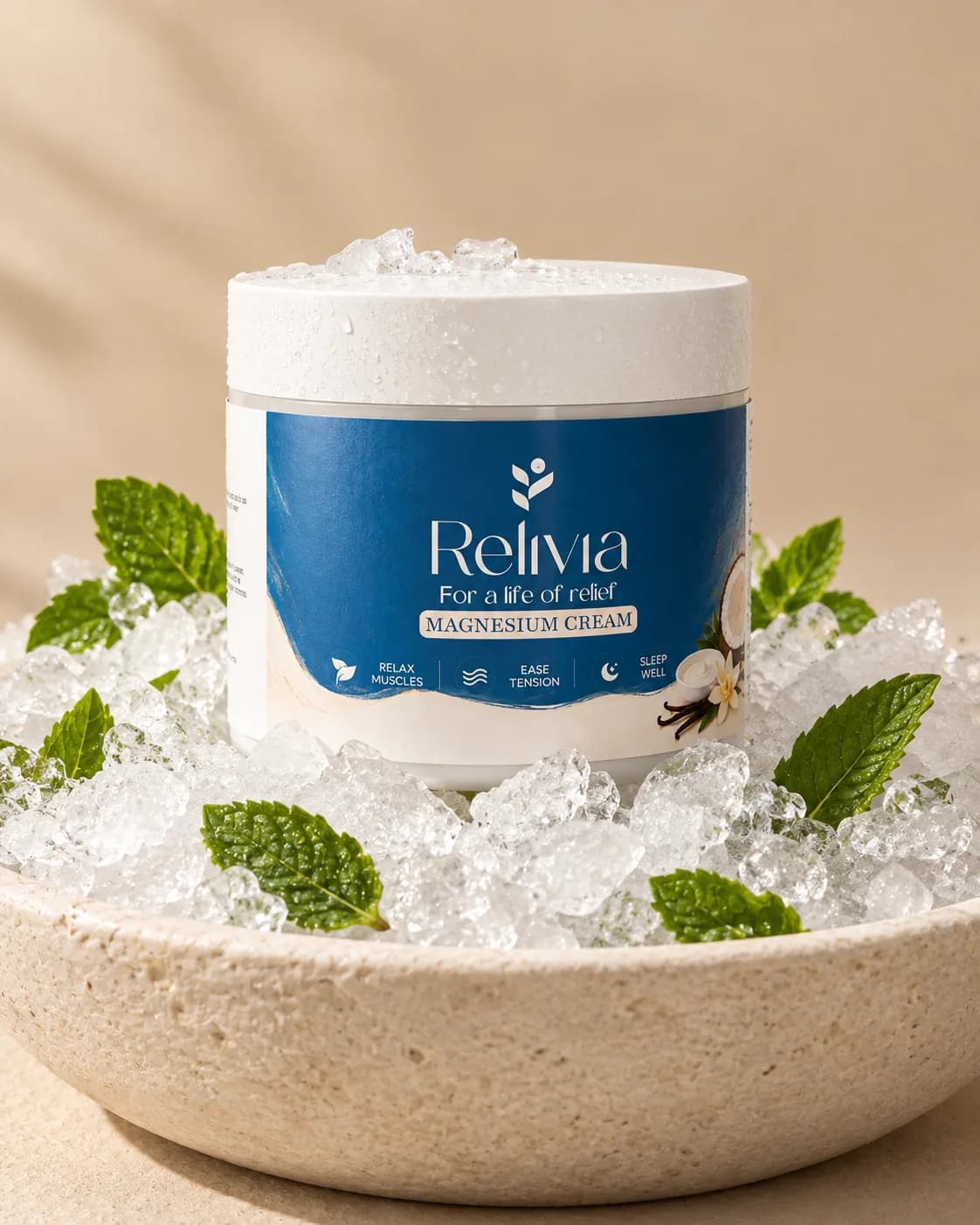 The jar set in a stone bowl of crushed ice and fresh mint leaves